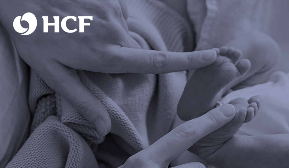 HCF logo and finger touching newborn feet